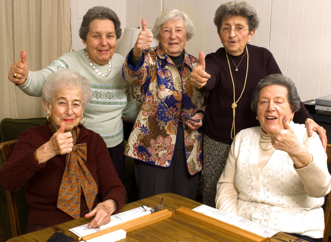 Women giving thumbs up